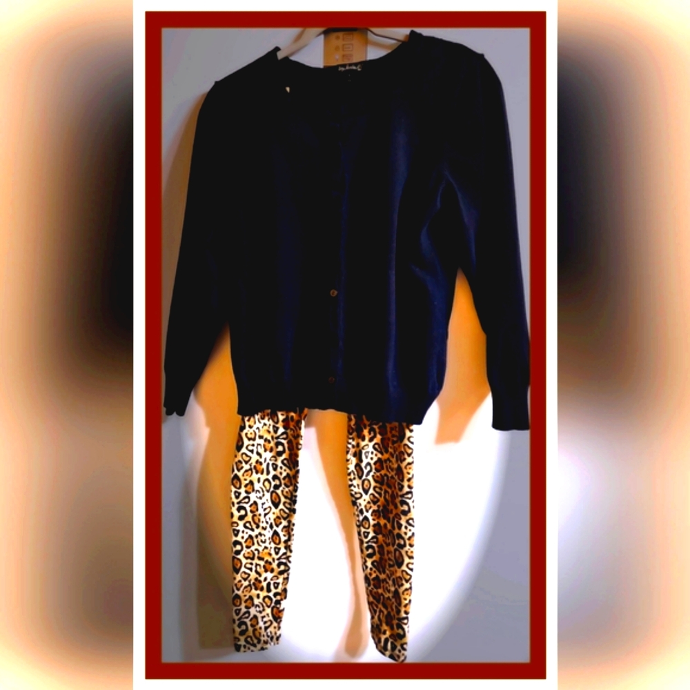 Black button-down sweater in size large for children and leopard leggings in siz